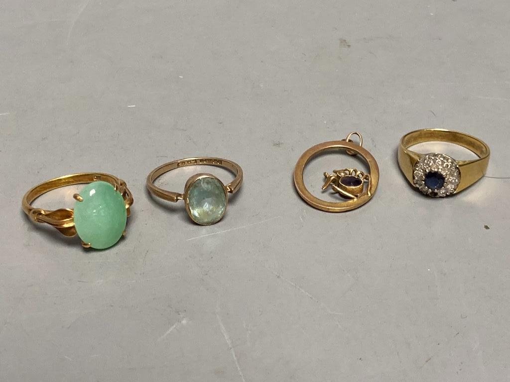 A yellow metal (stamped 14k) and green cabochon set ring, size N, gross 3.7 grams, a 9ct ring and spider pendant, gross 2.7 grams and one other yellow metal, sapphire and diamond ring (stone missing), gross 4.2 grams.